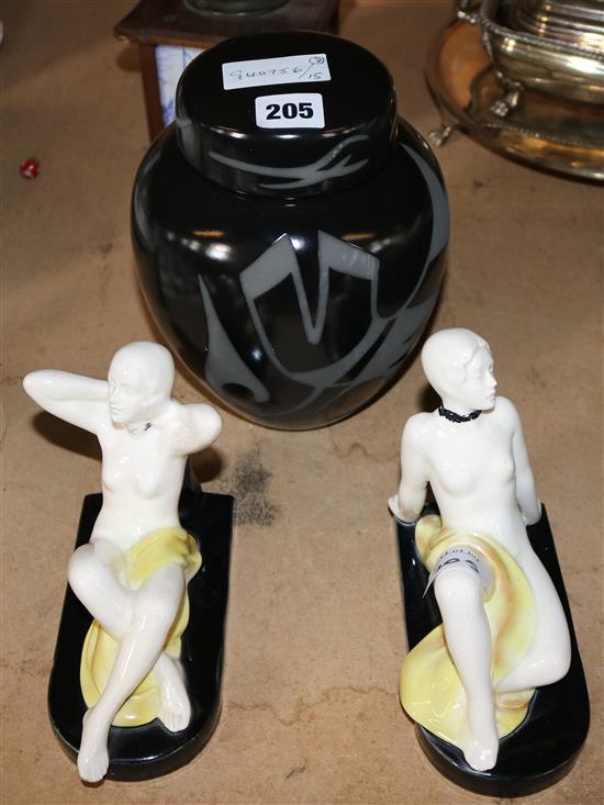 Figural bookends, jar & cover